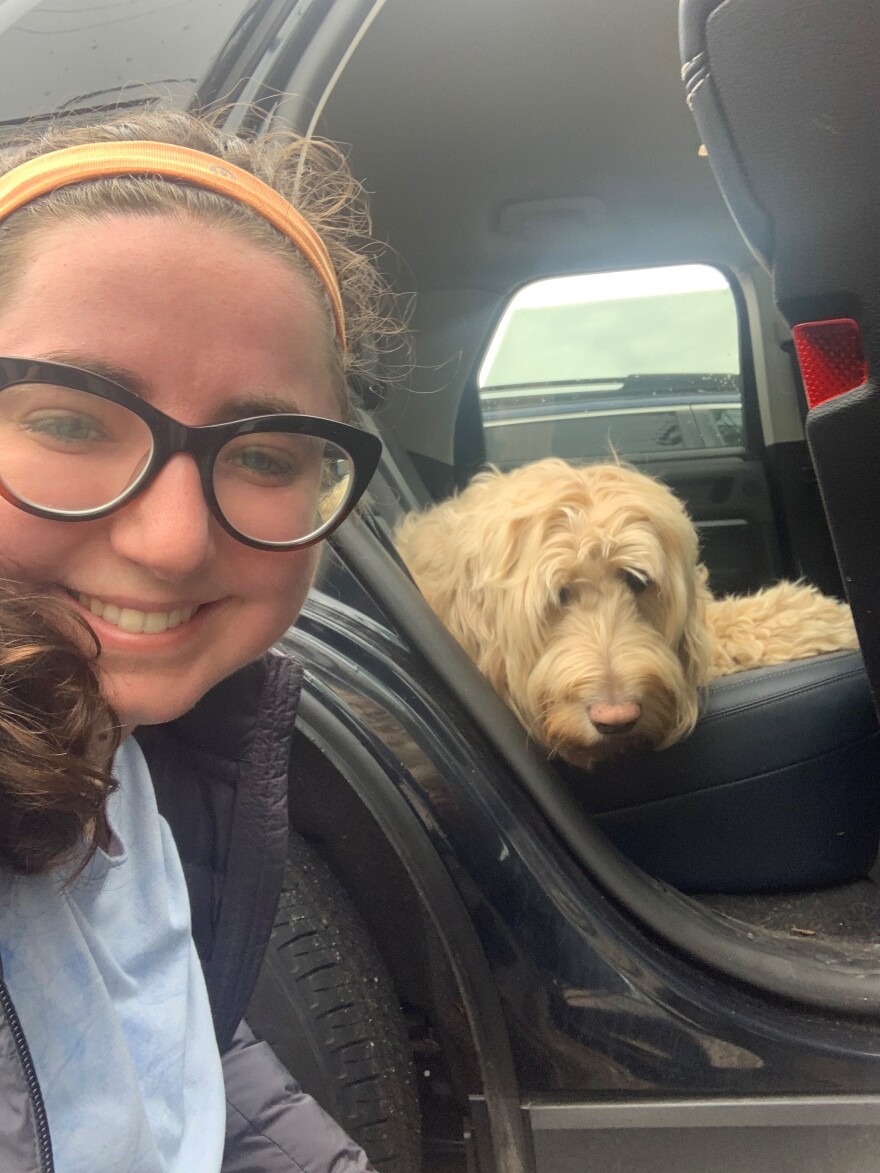 The sweaty author and her dog, who did not go to exercise class.